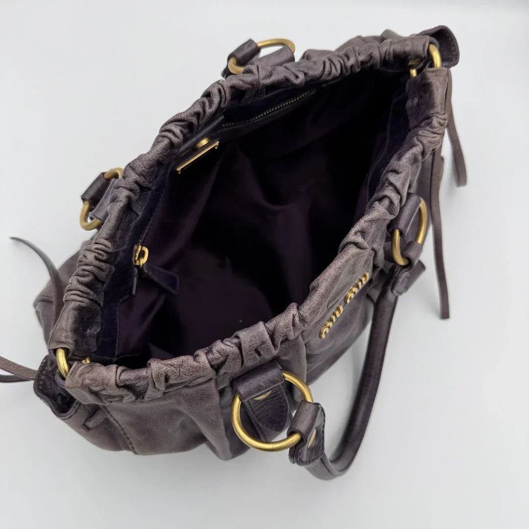 PreOwned Miu Miu Vitello Purple Leather Handbag